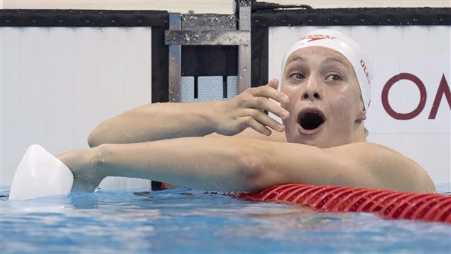 It took a moment for Penny Oleksiak to realize she had won silver in the 100-metre butterfly and had broken her own record.