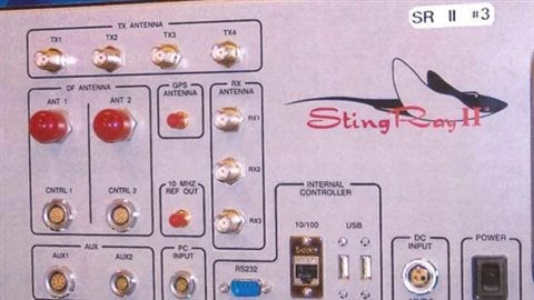 This undated photo, provided to The Associated Press by the U.S. Patent and Trademark Office, shows the StingRay II, manufactured by Harris Corporation, of Melbourne, Florida. We see the side of a big machine with lots of lights and switches on it. The company logo, a stingray, swims toward the left on machine's side.