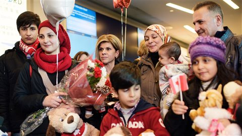 Des réfugiés Syrien arrivent au Canada. Crédit photo : Jimmy Jeong / Reuters