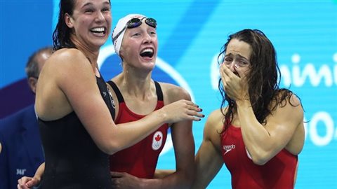 Trois de nos athlètes à Rio. Chantal Van Landeghem, Taylor Ruck et Sandrine Mainville. Même ces athlètes canadiens qui récoltent des médailles en arrachent financièrement s’ils compétitionnent dans un sport moins connu. Crédit photo : GI / Ian MacNicol