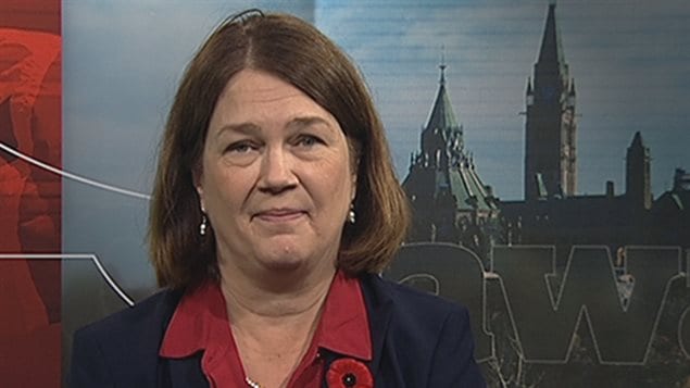Health Minister Jane Philpott has apologized for misusing funds.We see a somewhat sad-faced Philpott from the shoulders u with the Peace Tower in the background. She has long, brown hair parted on the right.