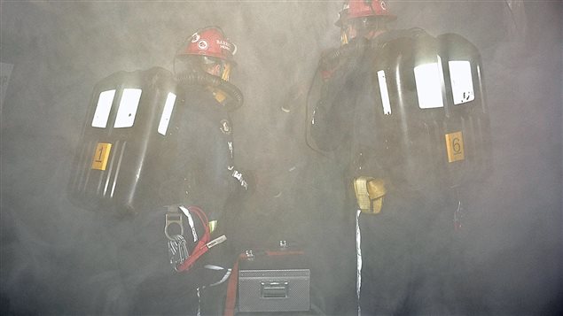 Photo from an Ontario provincial rescue competition simulating rescue in limited visibilty smoke situation