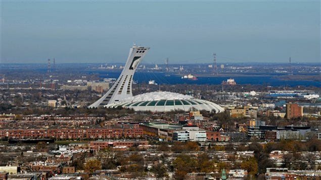 Montreal's Olympic Stadium has been plagued with problems ever since it was constructed. Now, more money is being injected to make it more energy efficient. We see the stadium and its tower looming over Montreal's East End.