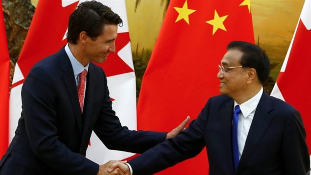 加中两国总理相见欢