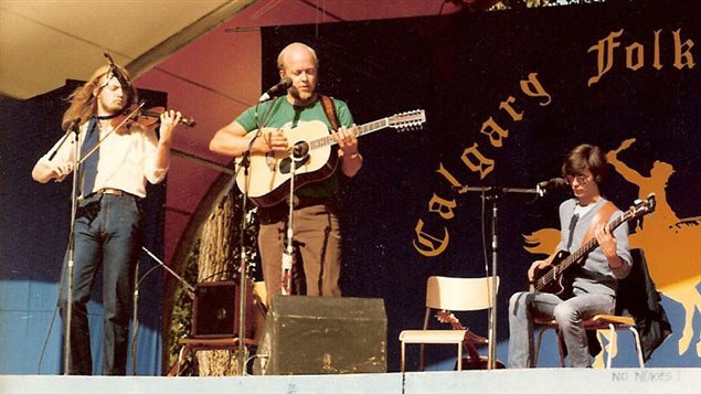 Garnet (left) and Stan Rogers with David Alan Eadie on bass at a Calgary Alberta folk event.