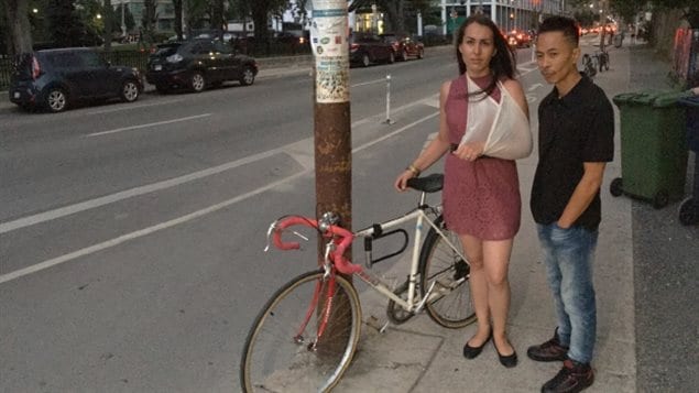 Cyclist Chelsea Mobishwash suffered injuries after being doored by a trucker. Her friend, Raymond Geluz, was behind and made sure she got medical help.