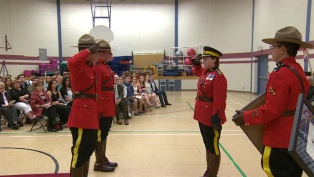 Several women have risen to command positions in the RCMP. Here two of 28 mounties recieve commendations for outstanding community service at a ceremony in St John’s, NL, in Jun 2014 from their commander Tracy Hardy