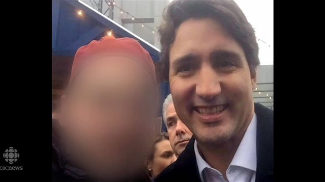 Moments later, the man asks the Prime Minister to take a selfie with him, standing directly beside him. Security experts are extremely concerned that a terror suspect got this close to the Canadian leader