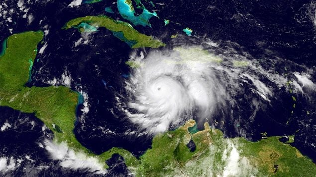  In this NOAA handout image, taken by the GOES satellite at 1315 UTC shows Hurricane Matthew in the Caribbean Sea heading towards Jamacia, Haiti and Cuba on October 3, 2016.