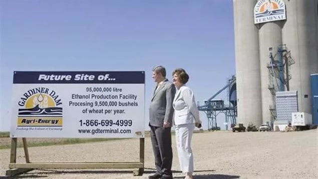 (then) Prime Minister Stephen Harper and MP Carol Skelton look at a ceremonial sign at the site of a future ethanol production plant during an announcement in Strongfield, Sask., on July 5, 2007, where they outlined federal investment of $1.5 billion in incentives over nine years to boost Canada’s production of biofuels