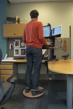 Sitting for long periods is considered such a health risk that some companies have installed standing desks.