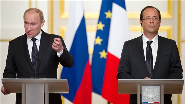 El presidente ruso Vladimir Putin y el presidente francés François Hollande.