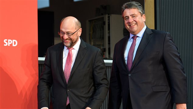 German Economy Minister Sigmar Gabriel (R) and Martin Schulz, President of the European Parliament, enter a news conference after a voting of Germany’s Social Democrats (SPD) on the the Comprehensive Economic and Trade Agreement (CETA), a trade deal between the European Union and Canada, in Wolfsburg, Germany, September 19, 2016.