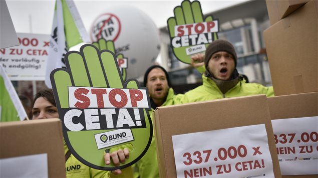 Protesters of BUND, a German non-governmental organisation (NGO) dedicated to preserving nature and protecting the environment, protest against CETA in front of the Chancellery in Berlin, Germany, October 12, 2016. 
