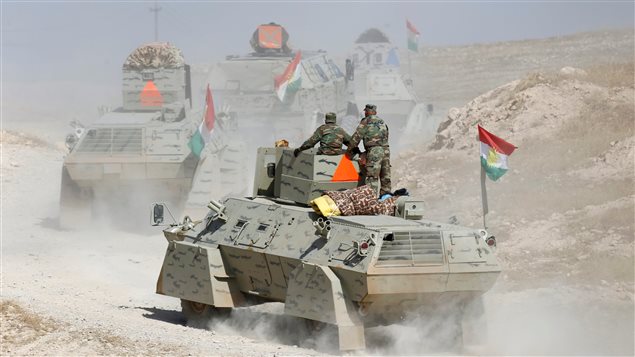 Peshmerga forces advance in the east of Mosul to attack Islamic State militants in Mosul, Iraq, October 18, 2016.
