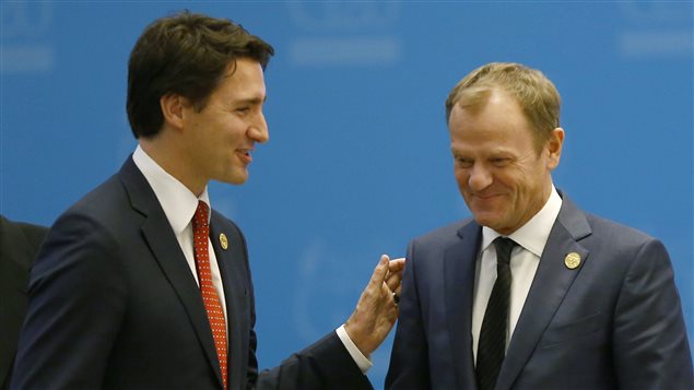 Canada’s Prime Minister Justin Trudeau and President of the European Council Donald Tusk (R) attend a working session at the Group of 20 (G20) summit in the Mediterranean resort city of Antalya, Turkey, November 15, 2015.
