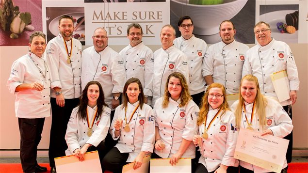 Gold medalists: (back row) Joerg Soltermann, Sean Burton, Austin Clement, Christian Marchsteiner, Kevin Boyce, Tim Cuff, Ben Wood, Hans Anderegg(Front row) Isabelle Cheverie, Kaitlyn Nixon, Sophie Hall, Rebecca van Bommel, Kaitlynn Broughton
