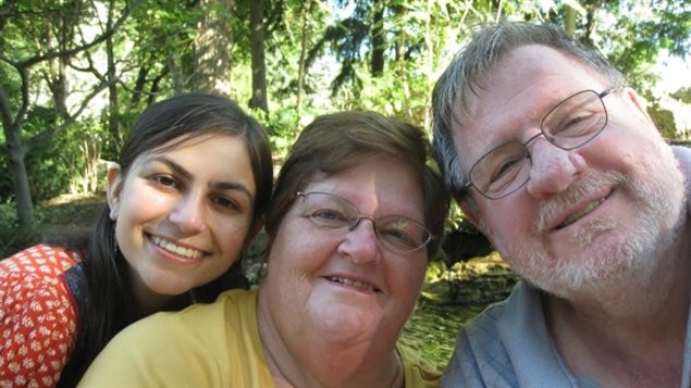 Rebecca with her parents, Davina and Dan Dixon. The family is suing fertility doctor Dr. Norman Barwin, the biological father of their daughter, who used his sperm during fertility treatment.