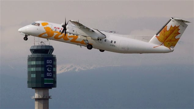 An Air Canada Jazz De Havilland DHC-8 takes off at Vancouver International Airport in Richmond, B.C., on May 30, 2011. 