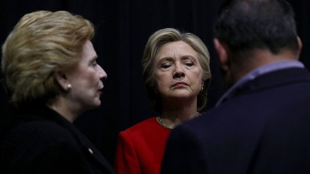 Democratic presidential nominee former Secretary of State Hillary Clinton waits backstage before the start of a campaign rally at Grand Valley State University on November 7, 2016 in Allendale, Michigan. 