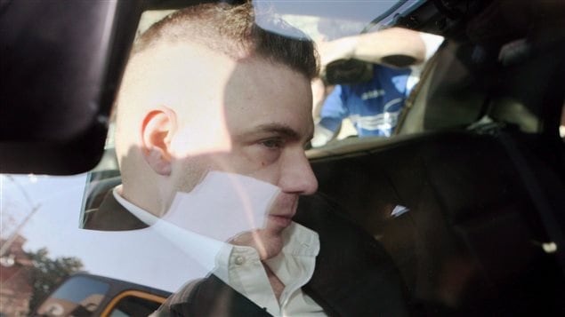 Michael Rafferty seen here in the back of a police car on March 14, 2012 was eventually convicted of kidnapping, sexual assault and murder.