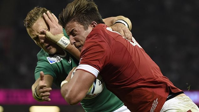 Canada’s D.T.H. van der Merwe, right, scores a try against Ireland at last year’s Rugby World Cup. The speedy winger makes his return for the national team in this weekend’s match against the Irish in Dublin. 