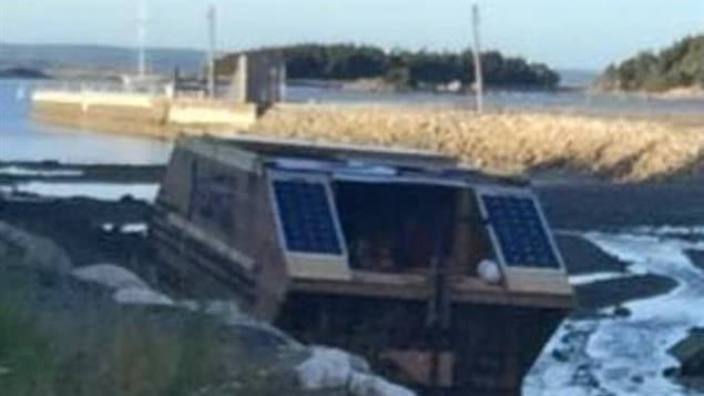 Timothy LeGrow of Conception Bay, Newfoundland, spotted this houseboat in a marine pond near his home.