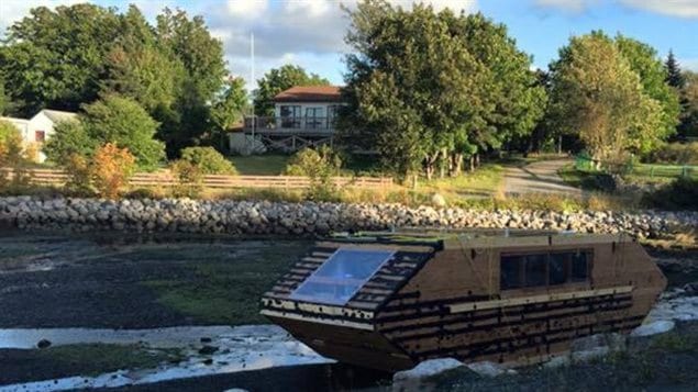 Timothy LeGrow of Conception Bay, Newfoundland, spotted this houseboat near in a marine pond near his house.