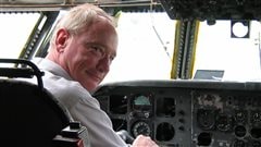 Chris Colton, executive director, sitting in the cockpit 