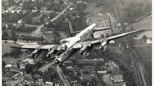 Lancaster KB882 flies over Edmundston, New Brunswick, on its final flight on July 14, 1964. the aircraft was parked and remained outdoors ever since, slowly deteriotating. News this week it will be collected by the National Air Force Museum in Trenton Ontario, and fully restored to its poswar reconnaissance role for display purposes, indoors.