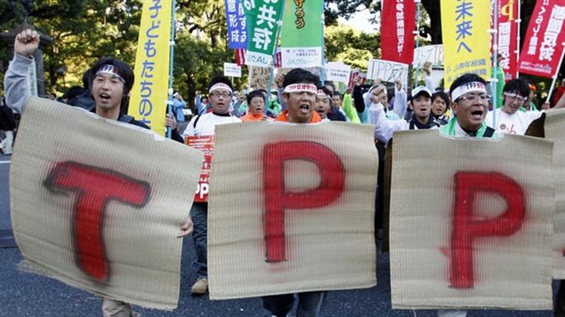 Farmers from tsunami-hit Miyagi Prefecture shout a slogan against a Trans-Pacific Partnership in 2011. Japan, like Canada, is presently pushing for the deal to coninue even if it is without the US 
