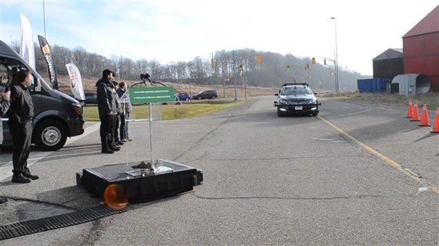 Autonomous Lincoln vehicle on the test track in Waterloo Ontario arriving for the press announcement