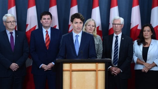 Prime Minister Justin Trudeau holds a press conference at the National Press Theatre in Ottawa on Tuesday, Nov. 29, 2016. Trudeau is approving Kinder Morgan's proposal to triple the capacity of its Trans Mountain pipeline from Alberta to Burnaby, B.C. — a $6.8-billion project that has sparked protests by climate change activists.