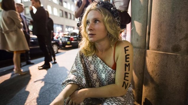 FEMEN activist Kseniya Chernyshova says in a Facebook post that she intends to fight charges of prostitution pressed against her by New York City police.