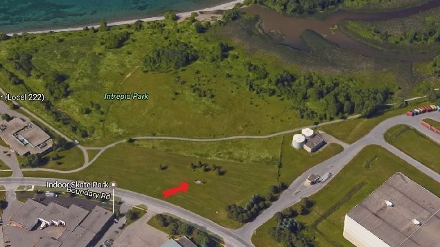 Camp X on the boundary of the municipalities of Whitby and Oshawa, near Toronto. In its day, there would have been nothing near the site. Now all that remains is a tiny memorial indicated by the red arrow