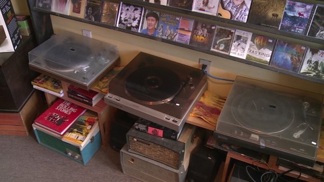 New models of record players have begun to show up in electronics shops where they hadn’t been seen in years. A reocrd shop in Charlottetown PEI, *Back Alley Discs* have begun selling used record players like these 