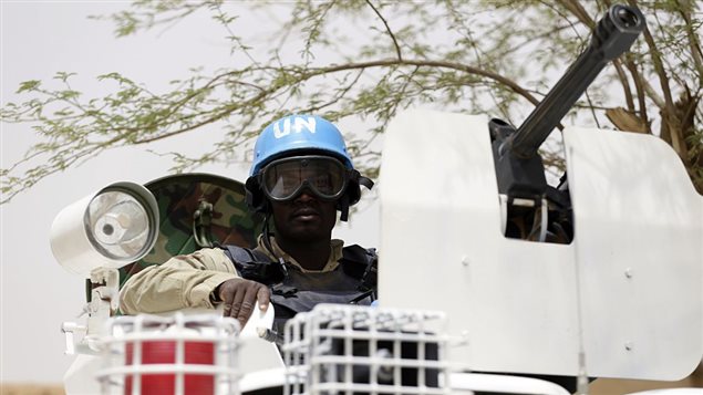 United Nations (UN) soldiers patrol on July 27, 2013 in the northern Malian city of Kidal.