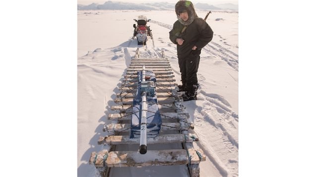 The conductivity meter. Paced on the sled it can be towed across the snow and ice behind a snomobile to further give thickness readings along specific known trails used by the community.