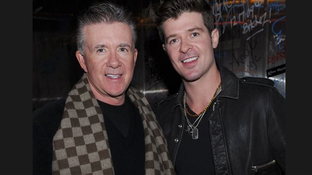 Alan Thicke, left, was proud of Blurred Lines singer Robin Thicke, his son with first wife Gloria Loring. The father and son are shown at a Sundance Film Festival event on Jan. 21, 2012, in Park City, Utah. After his dad’s death, Robin Thicke paid tribute to him in an Instagram post that said: ’He was the best man I ever knew. The best friend I ever had.’ 