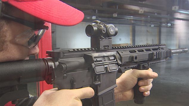 Many Canadian police forces have added military assault rifles to their arsenals. Here a CBC reporter tries the new Toronto Police weapon. Jan. 2016
