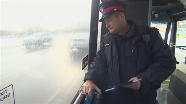 Riding the bus offers Sgt. Aaron Sidenberg of York Regional Police a better way to see texting drivers.