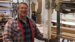 Gerry Geisler in the shop. The firm still uses original plans from almost 90 years ago, but as they are handmade, each and every boat has its own character.