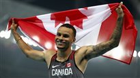 Andre De Grasse:triple medal winner.