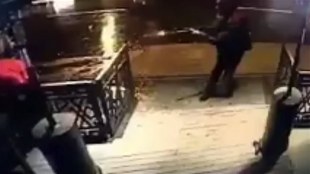 Video footage showing gunman firing a shot as he leaves the club