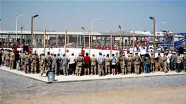 2007: More than 2,000 hockey fans from Canada and the United States crowded around the *rink* as temperatures reached 40 C in the baking Afghan sun.