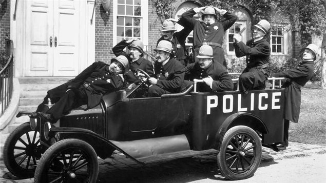 The bumbling Keystone Kops, a Sennett invention were wildly popular, indeed Sennett *invented* the wild chase scenes which often ended up in one or more wrecked cars, an idea copied over the years by many others including the Blues Brothers.