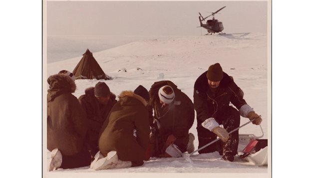 Soldiers as part of Operation Morning Light, digging into the snow to recover a piece of the Soviet spy satellite.