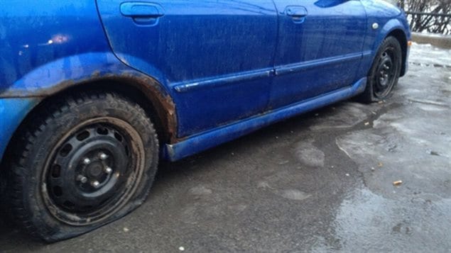 (2013) Hitting a pothole caused both tires on this care to be ruined. Often when hitting this hard, very often there is rim damage and very likely suspension damage as wall. Tire and alignment shops are always busy in Canada in winter and spring.