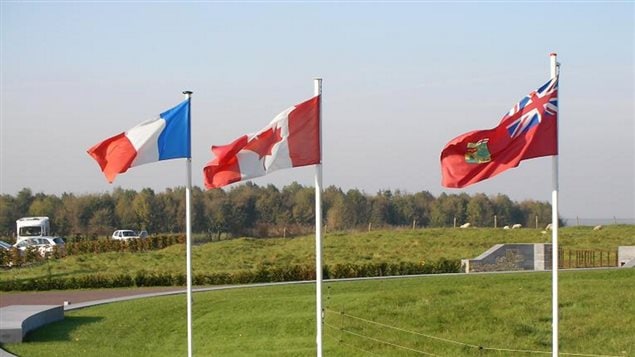 2007 Vimy Memorial France: Canada’s offficial national flag, the Maple Leaf in the centre flanked by the French tricolour and the First World War era unofficial Red Ensign flag of Canada