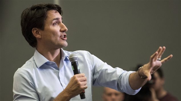 Prime Minister Trudeau speaks at the University of Saskatchewan campus in Saskatoon, on Wednesday. Trudeau says he is not worried about trade disputes with the U.S. under new president Donald Trump.